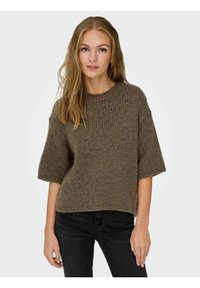 Brown ribbed knit sweater with short sleeves, round neckline, and a relaxed fit. Pairing with black jeans, featuring a textured fabric.
