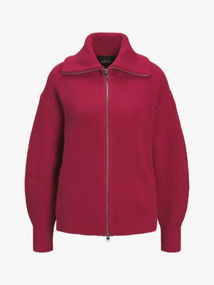 Piros kötött felül zipzáras pulóver bordázott mandzsettákkal és gallérral, magas gallérral és teljes fém cipzáras záródással.