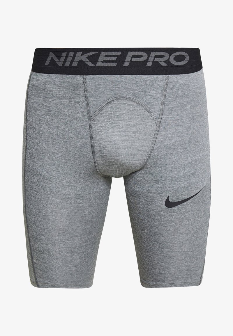 Shorts de compression Nike Pro gris avec ceinture élastique noire et logo Nike swoosh noir sur la cuisse droite.