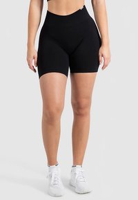 Sorte atletikshorts med høj talje, lavet af strækbart materiale. Har en glat tekstur og tætsiddende design, ideel til træning.