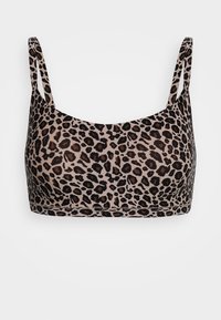 Leopardprint bralette met dunne bandjes. Gemaakt van zacht materiaal, met een beige achtergrond en donkere bruine vlekken. Naadloze randen.