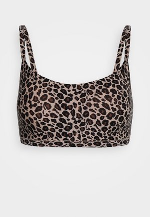Leopardmønstret bralette med tynde stropper. Fremstillet af blødt stof, med en beige baggrund og mørkebrune pletter. Uden sømme.