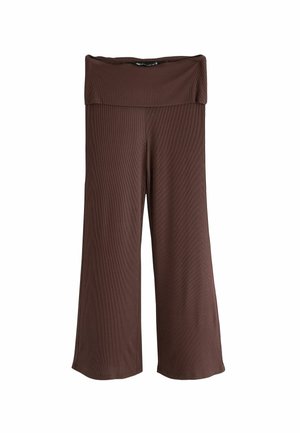 Brown wide-leg pants made from ribbed material. Features a thick waistband and side slits, offering a loose fit and comfortable design.