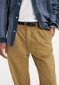 Levi's® - Chinosy