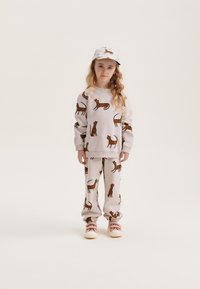 Liewood THORA UNISEX - Sportska majica - sandy