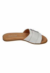 White slide sandal featuring a smooth leather upper, three horizontal straps, and a metallic accent. Brown sole with a cushioned insole.