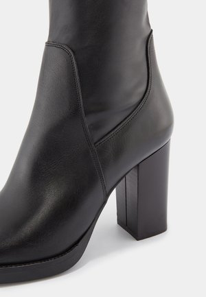 Højhælede støvler - black