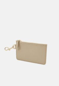Tommy Hilfiger MONOTYPE HALF MOON - Borsa a tracolla - beige