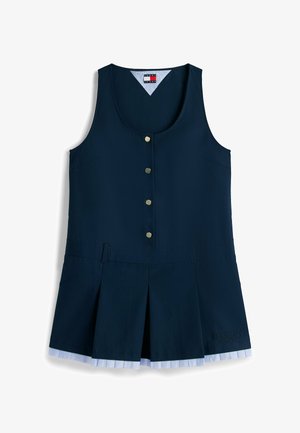 Robe sans manches bleu marine avec boutons à l'avant, jupe plissée, ourlet rayé bleu clair contrastant et logo Tommy Jeans.