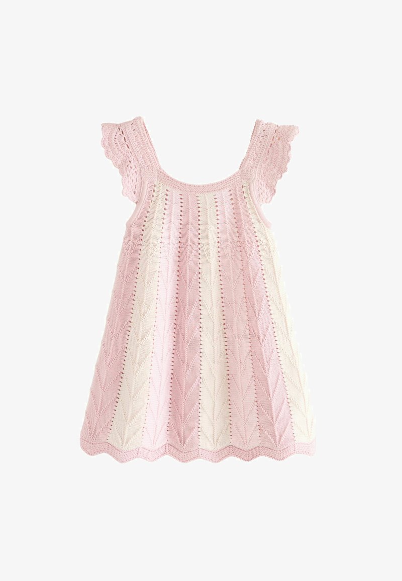 Light pink and cream knitted sleeveless baby dress with scalloped edges and lace detail on the shoulder straps.