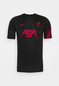 Černý dres Liverpool FC s kulatým výstřihem, krátkými rukávy a jemným vzorem. Červené akcenty zahrnují logo AXA a detaily na rukávech.