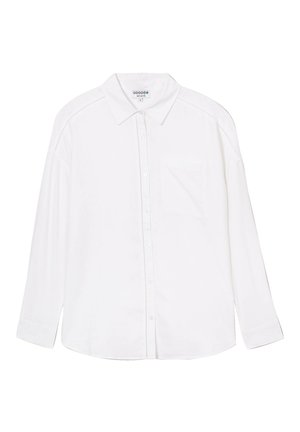 Witte lange mouwen overhemd met knoopjes, met kraag en een borstzak, voorzien van subtiele stiksels langs de schouders en de knoopsluiting.