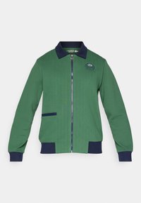 JACKET HERITAGE - Veste de survêtement - green/navy blue