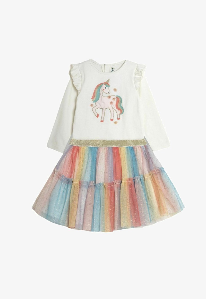 Langärmliges weißes Kleid mit Rüsche an den Schultern, verziert mit einer Einhornstickerei und einem mehrfarbigen Tüllrock mit Glitzerakzenten.