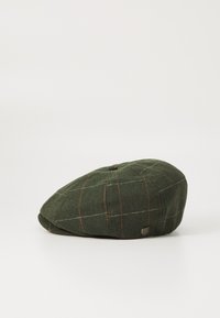 Green herringbone cap with flat peak, featuring a plaid pattern of white and orange lines, and a small metal logo accent on the side.