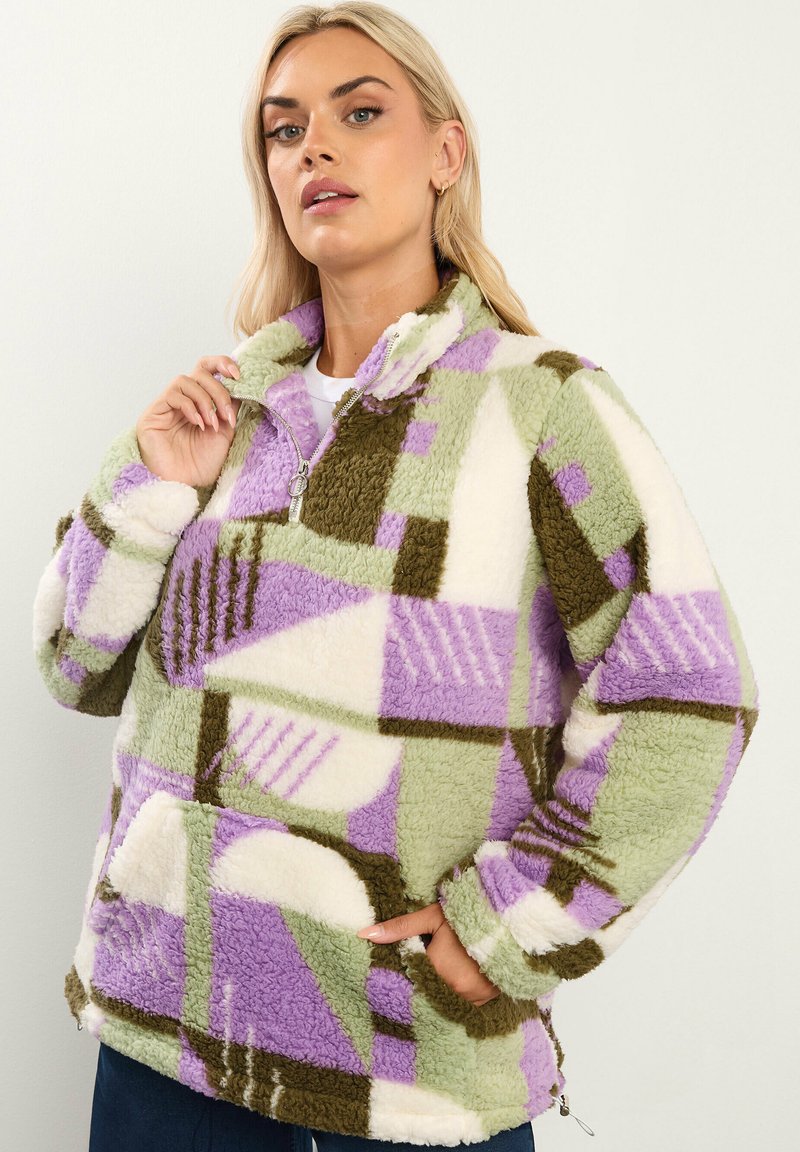Fleece pullover met een rits aan de nek, voorzien van een geometrisch patroon in groen, lila en wit. Zachte textuur en zijzakken.