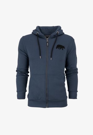 Sudadera con cremallera de color navy hecha de material de forro polar, con un emblema de oso negro en el pecho, capucha con cordón ajustable y puños acanalados.