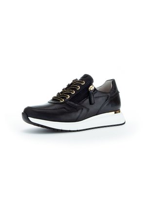 Black leather athletic sneaker with gold accents, textured sides, and a white sole. Features lace and zip closures for secure fit.
