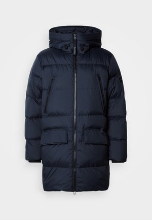 Námorná pufrovacia bunda so zipsom, nastaviteľnou kapucňou, dvoma zipsovými vreckami na hrudi a dvoma prednými vreckami na klopu. Hladká textúra a prešívaný dizajn.