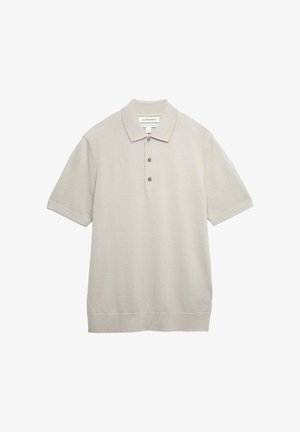 Light beige short-sleeve polo shirt with three buttons and a flat collar, made of cotton and wool blend fabric.