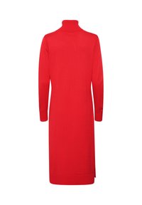 Abito rosso lavorato a maglia con colletto alto, maniche lunghe e fessure laterali. Texture liscia e design aderente, che arriva fino a metà polpaccio.