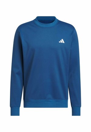 Plava majica s dugim rukavima od mekanog tkanja, s okruglim izrezom. Sadrži mali bijeli Adidas logo na lijevoj strani prsa.