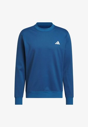 Plava majica s dugim rukavima od mekanog tkanja, s okruglim izrezom. Sadrži mali bijeli Adidas logo na lijevoj strani prsa.