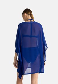 DORINA MOKOLO COVER UP - Rannatarvikud - blue