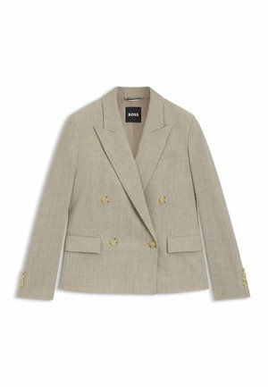 Blazer beige croisé avec un revers cranté, quatre boutons sur le devant, deux poches à rabat et des poignets boutonnés, posé à plat.