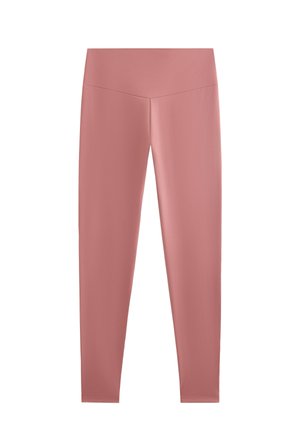 Lichtroze leggings gemaakt van een rekbaar, glad materiaal. Hoge tailleband met een naadloos ontwerp. Volledige lengte zonder zichtbare patronen of accenten.