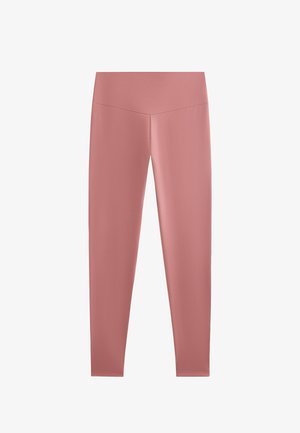 Világos rózsaszín leggings rugalmas, sima anyagból. Magas derekú, varrás nélküli kialakítás. Teljes hosszúságú vágás, látható minták vagy díszítések nélkül.