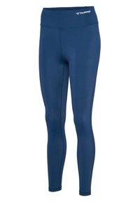 Granatowe legginsy o gładkiej fakturze, wysokim stanie, szwach płaskich oraz subtelnym logo na pasie. Zaprojektowane do użytku aktywnego.