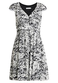 Šaty bez rukávů s květinovým potiskem v černobílé barvě, s výstřihem do V a nařaseným pasem.