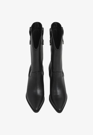 Pair of black leather pointed-toe ankle boots with side pull tabs, viewed from above on a white background.