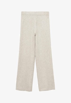 Jasnobeżowe spodnie o szerokich nogawkach wykonane z miękkiej tkaniny o gładkiej fakturze, z elastycznym pasem. Bez wzorów i metalowych detali.