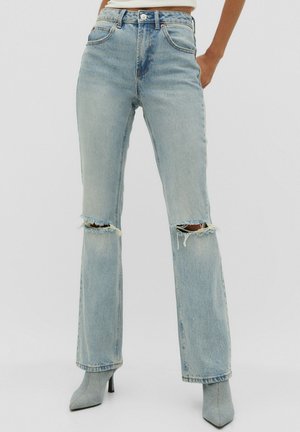 Vaqueros a campana - stone blue denim