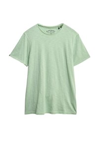 Camiseta corta de manga corta en verde claro, hecha de una suave tela texturizada. Presenta un cuello redondo y un sutil patrón de rayas tono sobre tono. Etiqueta de la marca en el interior del cuello.