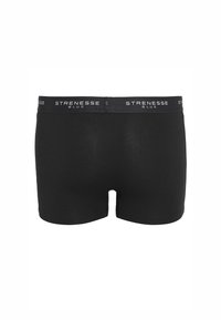 Schwarze Baumwoll-Boxershorts mit glatter Textur, mittlerer Bundhöhe und einem gebrandeten Bund mit der Aufschrift "STRENESSE BLUE" in weißer Schrift.