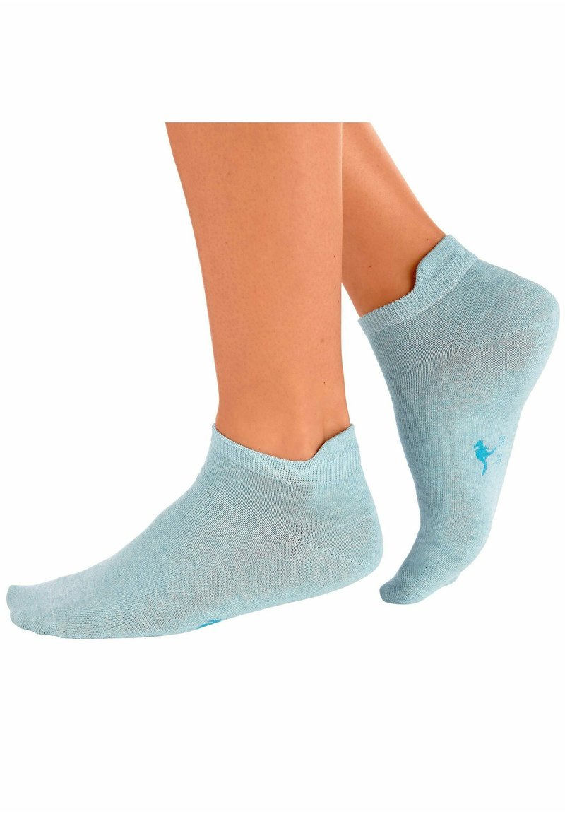 Light blue ankle socks feature a ribbed cuff, soft texture, and a small logo on the outer side of each sock.