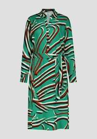 Groene jurk met lange mouwen, een kraag, knoopsluiting en een tailleriem. Bevat abstracte bruine en witte golfpatronen. Gladde stofstructuur.