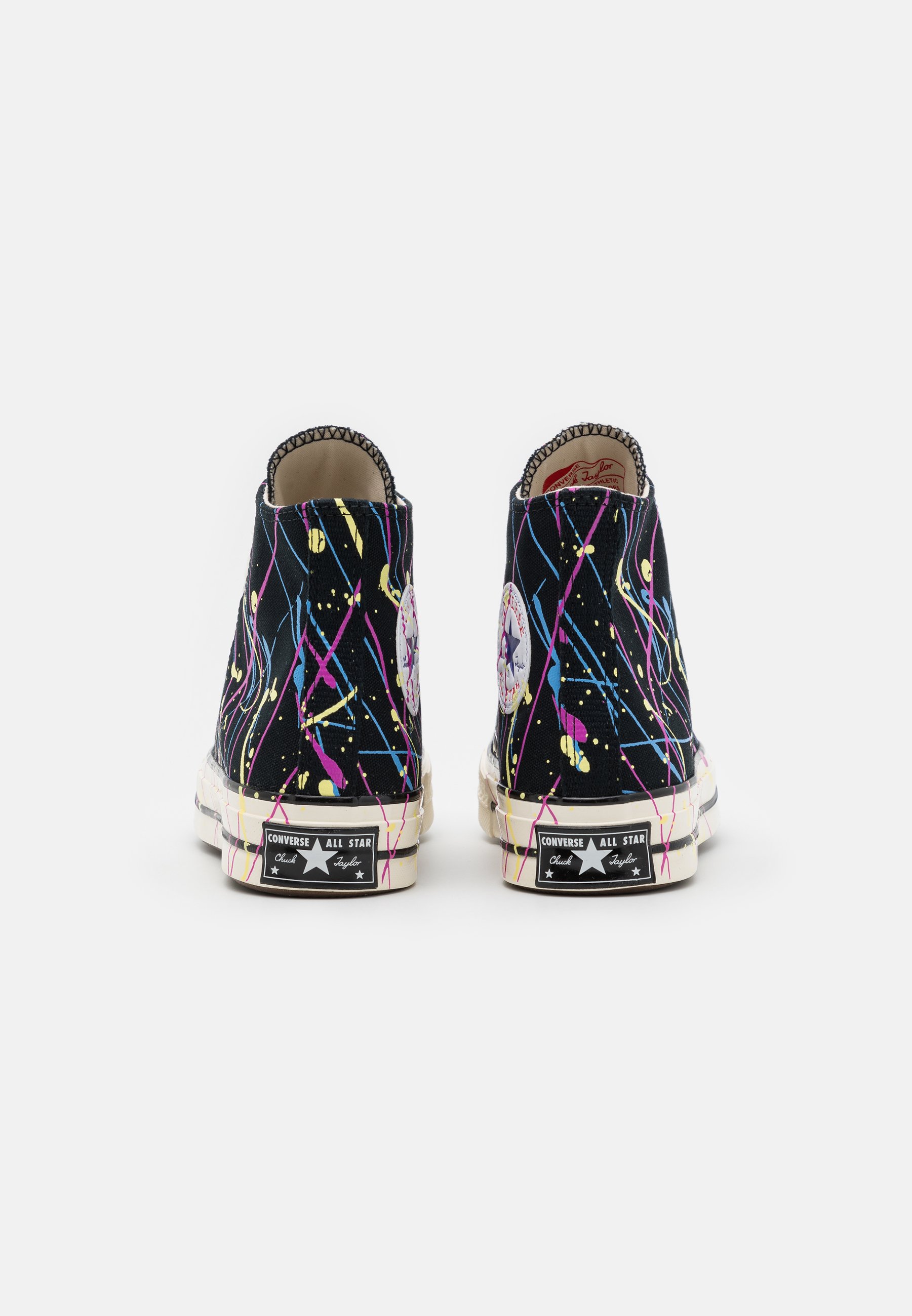 magenta high top converse
