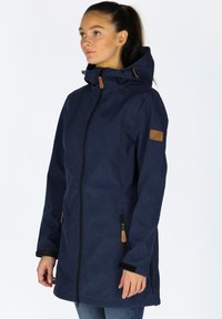 Navy blue long jacket with a zip front, featuring a hood, two zippered side pockets, and brown leather accents on the zipper and sleeve.
