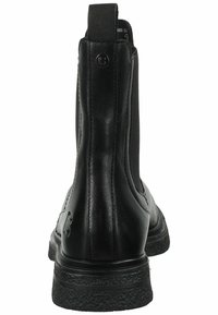 Botas negras hasta el tobillo hechas de cuero suave con paneles laterales elásticos, suela de goma texturizada y una tira en la parte posterior para facilitar el calzado.