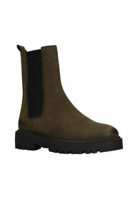 Bruine leren enkellaars met elastische zijkanten, ronde neus en een stevige zwarte rubberen zool met een profielpatroon.