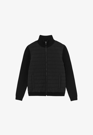 Black full-zip jacket with ribbed high collar and sleeves, quilted front panel, and two front pockets.