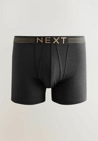 Fekete boxer alsónadrág puha anyagból. Kényelmes derékpánttal rendelkezik, amelyen arany színnel a "NEXT" felirat található, és illeszkedő fazonú, elöl zsebes kialakítással.
