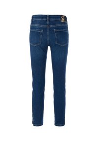 Blue denim jeans with a slim fit, five-pocket design, and back pockets. Features visible stitching and a mid-rise waistband.