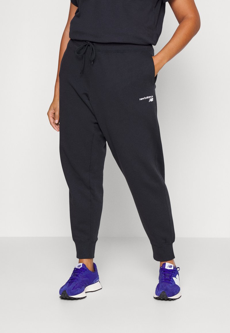 New Balance CLASSIC CORE PANT PLUS Tracksuit bottoms black Zalando.de