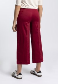 RAGNO SATIN POER - Pantaloni - bordeaux