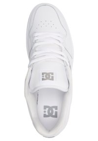 White sneaker with a smooth leather exterior, flat laces, perforated toe, and a padded collar. Features a logo tag in grey.